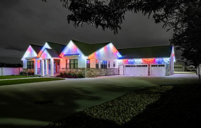 Home with permanent holiday lighting